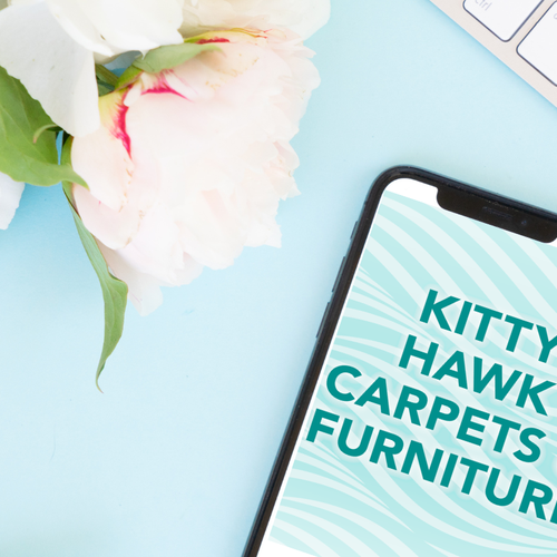 Woman with tablet - Contact Kitty Hawk Carpets & Furniture in NC